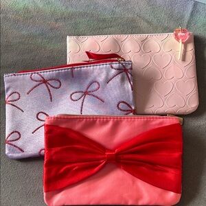 Set of Three Pink and Red IPSY Cosmetic Bags
